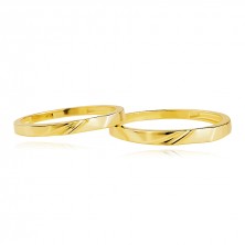 Wedding bands in 585 yellow gold - wavy diagonal notches, dent