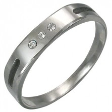 Tungsten ring with two sections and three zircons