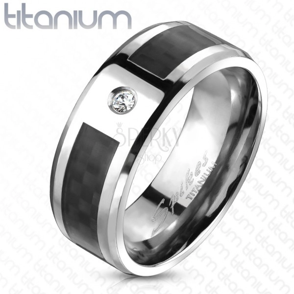 Ring made of titanium with grid pattern and zircon