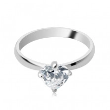 Silver ring with protrudent clear heart zircon