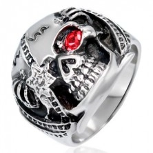 Massive ring made of steel - warrior´s scull with red zircon, patina