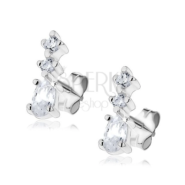 Silver stud earrings - row of three glimmering zircons