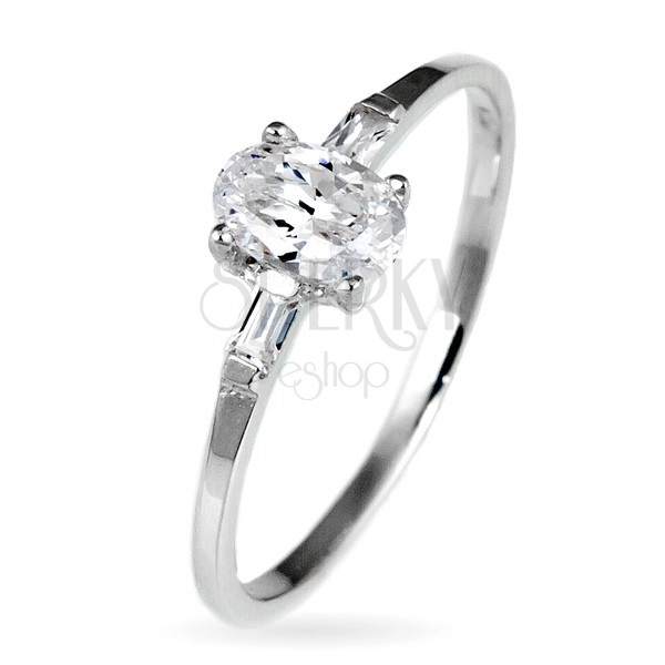 Silver engagement ring - oval zircon and two smaller zircons on sides