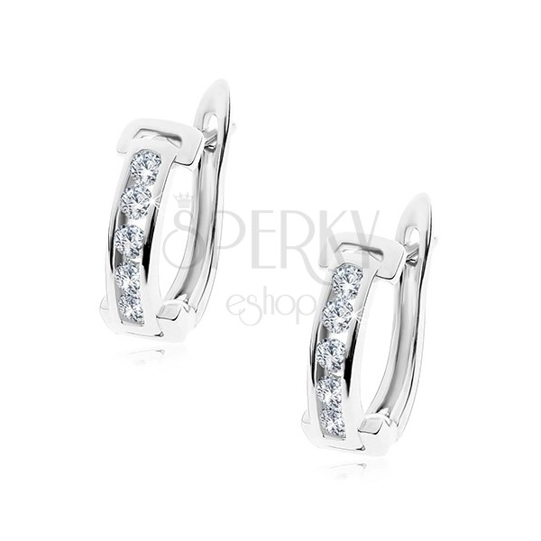Earrings in silver colour, hoop with line of clear zircons